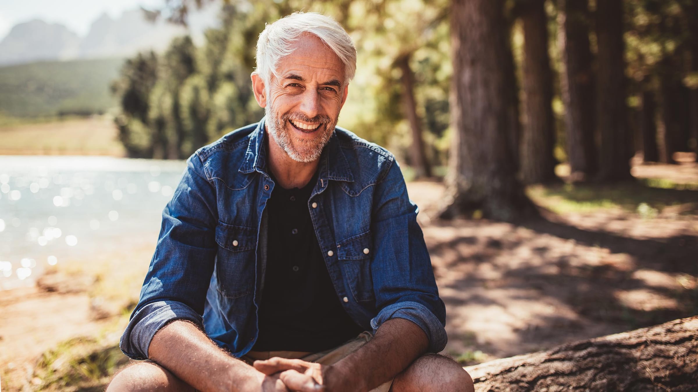 Active senior man smiling outdoors